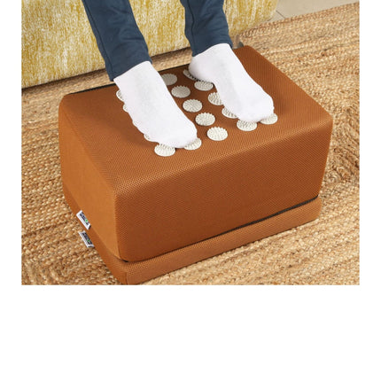 Acupressure foot rest under desk for office use, ergonomic footrest improves posture and reduces leg fatigue
