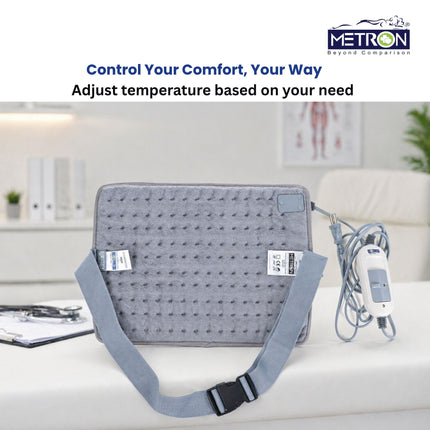 Electric heating pad placed on table for home use showing effective solution for back pain muscle pain and heat therapy by Metron