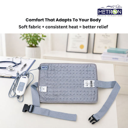 Electric heating pad placed on table for home use showing effective solution for back pain muscle pain and heat therapy by Metron