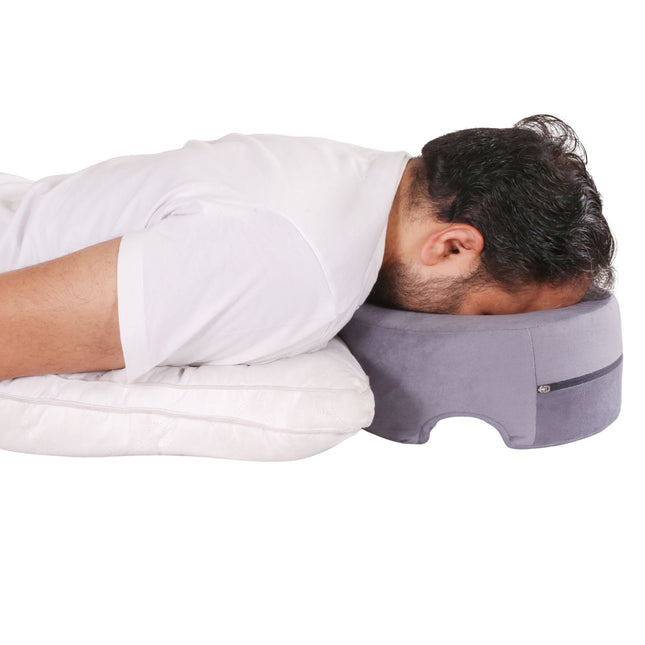 man using face down pillow after eye surgery for vitrectomy recovery sleeping in prone position at home india