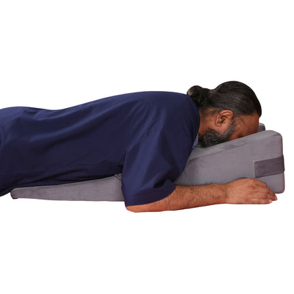 man using face down pillow after eye surgery for vitrectomy recovery sleeping in prone position at home india