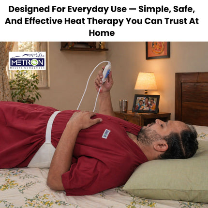 heat therapy for back pain relief while resting at home using heating pad metron