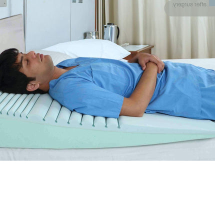 man sleeping comfortably with wedge pillow for acidity relief and better breathing during night sleep metron