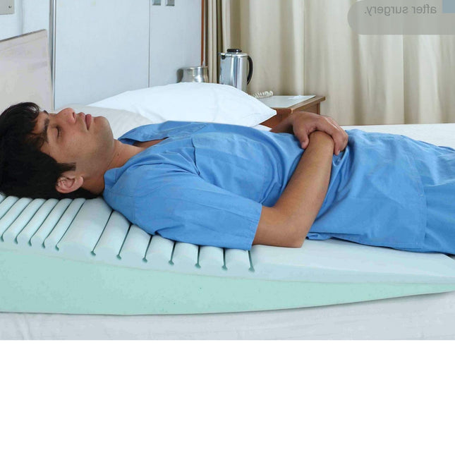 man sleeping comfortably with wedge pillow for acidity relief and better breathing during night sleep metron