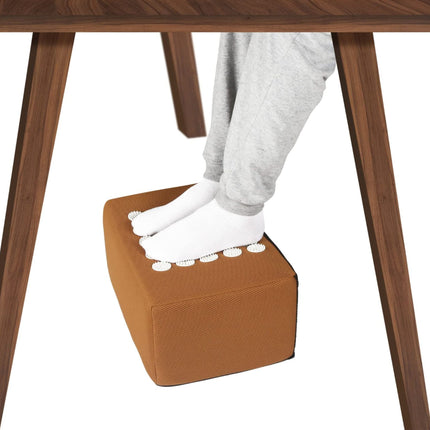Under desk acupressure foot rest for comfortable sitting reducing fatigue and enhancing support